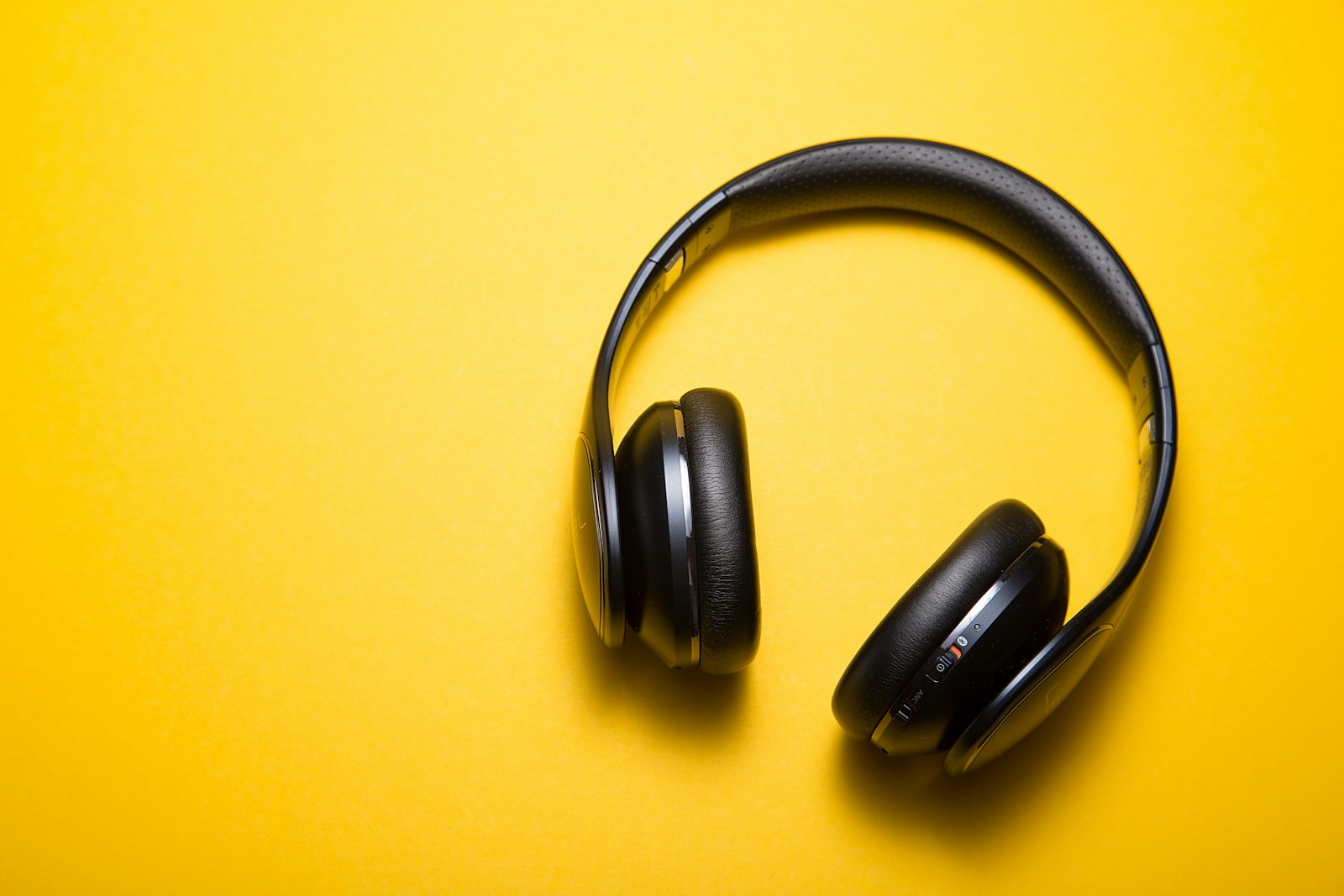 Black over-ear headphones with leather pads